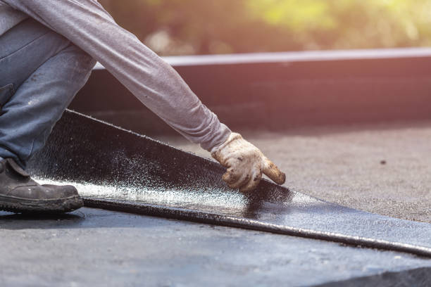 Professional Waterproofing technician working in Hazlet, NJ